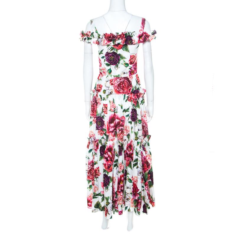 Dolce&Gabbana presents you this soul-soothingly beautiful midi dress that comes flaunting peony prints all over. It is made of cotton and it carries a flowy skirt and a cold-shoulder design. You can wear this dress with sleek sandals and sling