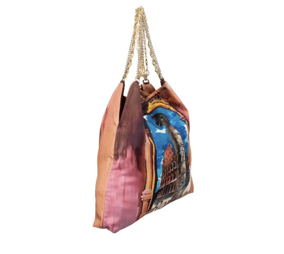 Dolce & Gabbana Iconic Silk Pearls Shopper bag ROMA 

100% Silk Tote / Shopper Bag with ROMA Print and two metal chain handles embellished with pearls by DOLCE & GABBANA
- New with Tag, Dustbag and Authenticity Card
-  RRP: appr. EUR 1.450
-