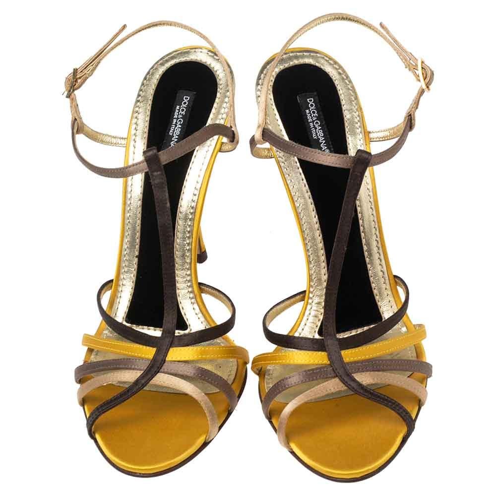 One of the most celebrated fashion House, Dolce & Gabbana is known for its brilliant craftsmanship in shoemaking. Crafted from leather in multiple shades, the strappy style, and gold-tone buckles will adorn your feet in the most beautiful way. Style