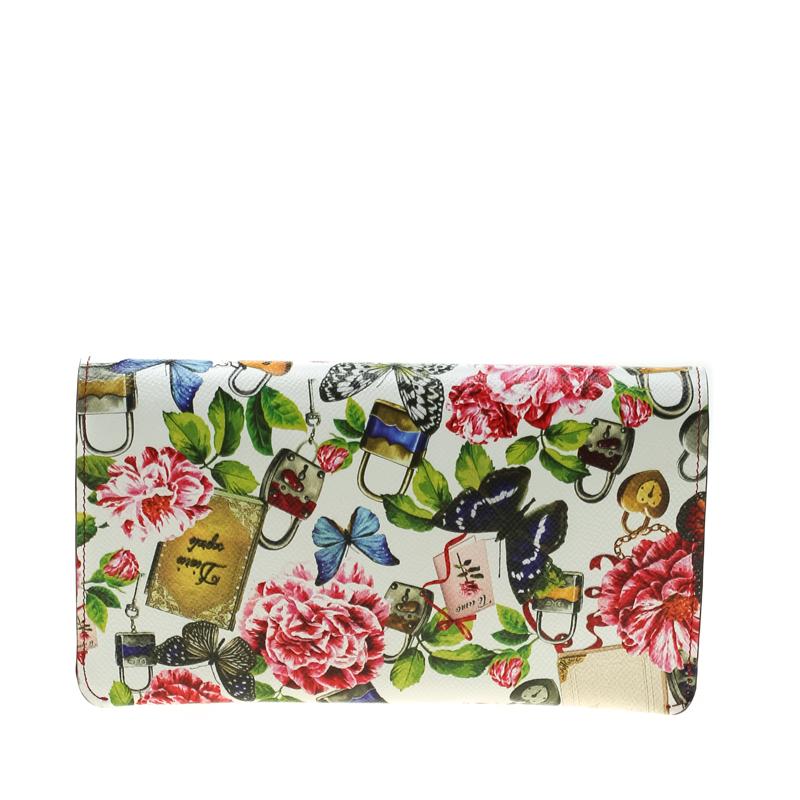 Add a stunning creation to your closet with this rich and fabulous Dolce & Gabbana piece. Designed with the brand's signature free-spirited vibe, the clutch is crafted from leather and is adorned with a beautiful secret butterfly print depicting