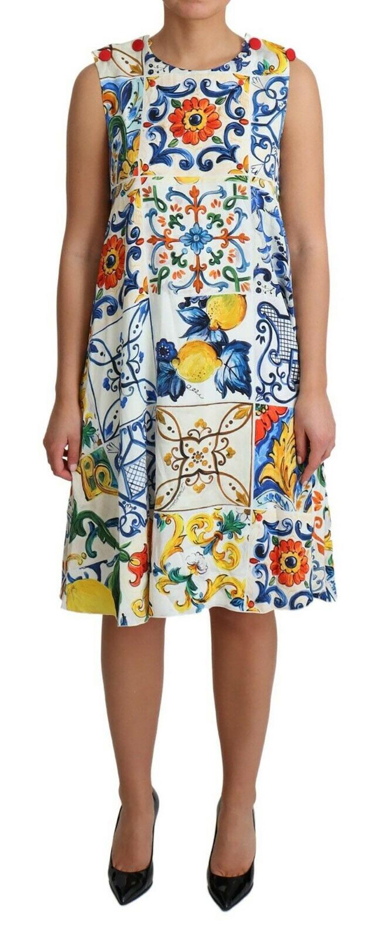 Gorgeous brand new with tags, 100% Authentic Dolce & Gabbana silk sleeveless dress with majolica print.

Model: Knee length dress

Color: White majolica print

Zipper closure on the back

Logo details
White silk stretch inner lining

Made in