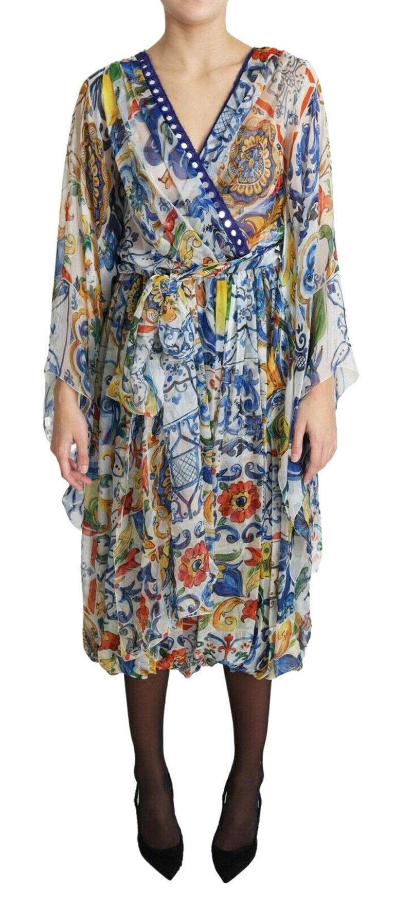 Gorgeous brand new with tags, 100% Authentic Dolce & Gabbana silk wrap style dress. It features all-over majolica print, v-neck and concealed back zip closure.

Model: Wrap, midi dress

Color: Multicolor majolica print

Zipper opening on the