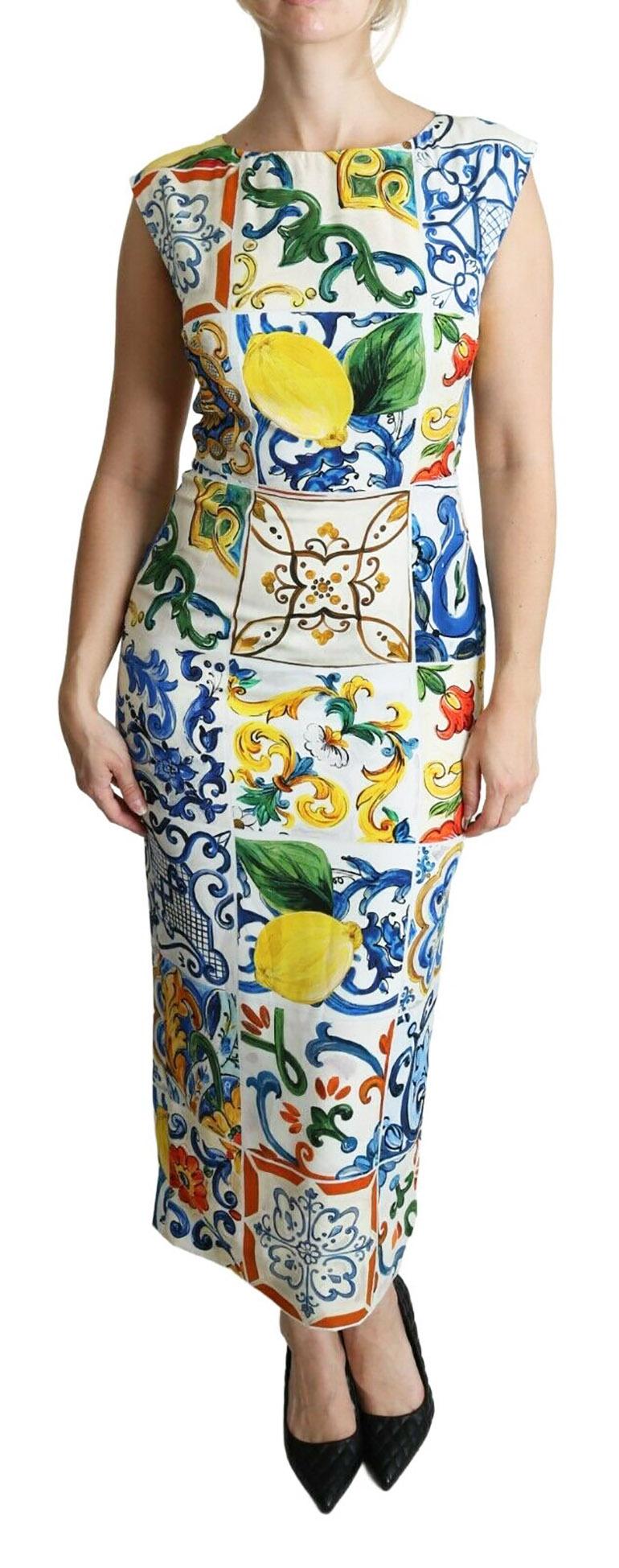 DOLCE & GABBANA

Gorgeous brand new with tags, 100% Authentic Dolce & Gabbana Dress conveys the beautiful blue, yellow and green hues of the Mediterranean, fashioned from native rustic floral Majolica tile print for a colourful touch. 

Model: