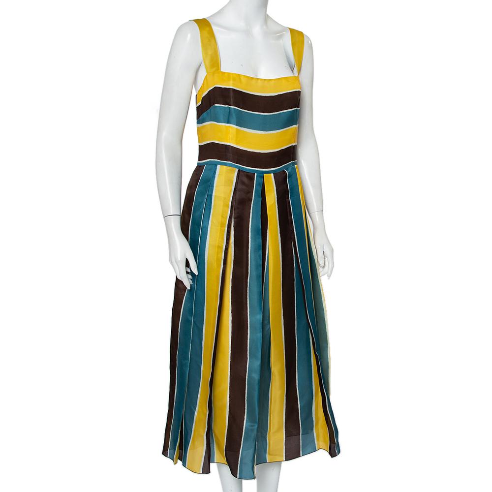 Ensure your casual style is full of charm with this multicolored Dolce & Gabbana dress. Made from silk, this beautiful striped dress is gathered at the waist and secured with a zip fastening at the back.

