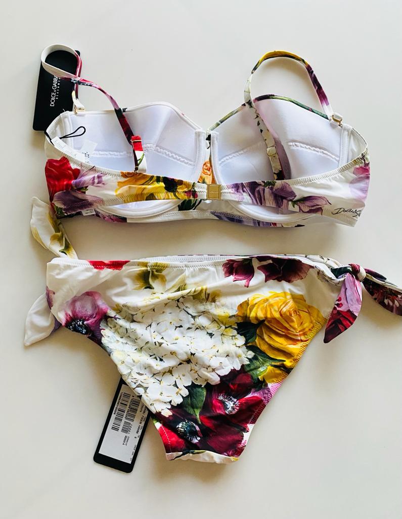 Dolce & Gabbana timeless balconette bikini top and bottoms set in fine fabric comes in PINK FLORAL print and is perfect for enhancing every woman’s femininity:
-	Bra with padded cups and wiring
-	Rear branded fastening in nickel-free gold-plated