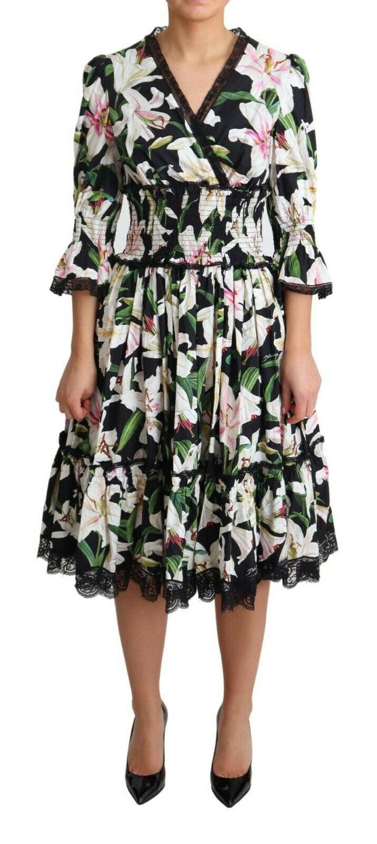 Gorgeous brand new with tags, 100% Authentic Dolce & Gabbana floral cotton midi dress.

Model: Midi dress

Color: Black floral print

Zipper closure on the back

Logo details

Made in Italy

Material: 89% Cotton 9% NYlon 2% Rayon

Lining: 100%
