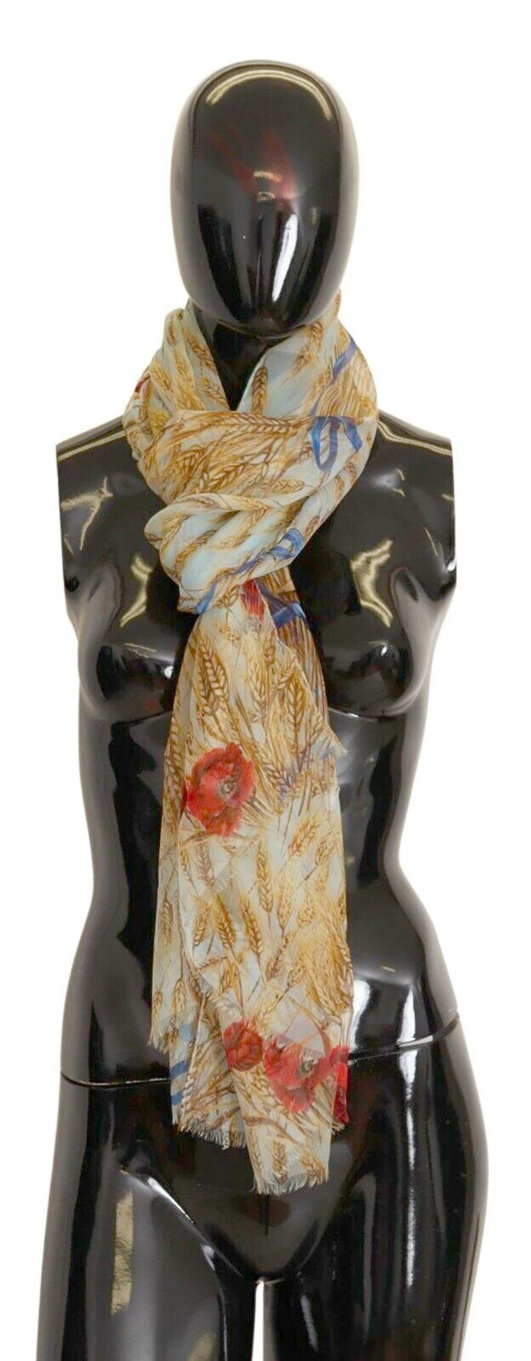 Dolce & Gabbana silk scarf 
 
 Add a touch of charm to all your everyday or beach looks with this sophisticated print scarf in precious and light silk twill: 
 * Hand finished hems 
 * Dolce & Gabbana logo at the bottom 
 * Dimensions: 70 x 200 cm 

