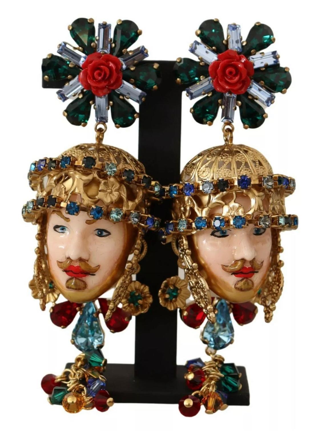 DOLCE & GABBANA

Gorgeous brand new with tags, 100% Authentic Dolce & Gabbana earrings.

Model: Clip-on, dangling
Motive: Pupi Carretto
Material: 50% Brass, 20% Glass, other
Color: Gold with multicolor crystals
Logo details
Made in Italy

Length: