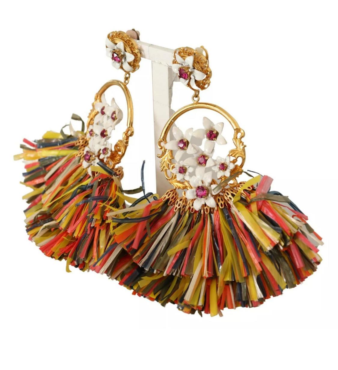 DOLCE & GABBANA

Gorgeous brand new with tags, 100% Authentic Dolce & Gabbana earrings.

Model: Clip-on, dangling
Motive: Raffia floral
Material: 40% Brass, 10% Crystal, 50% Raffia
Color: Gold with multicolor detailing
Logo details
Made in