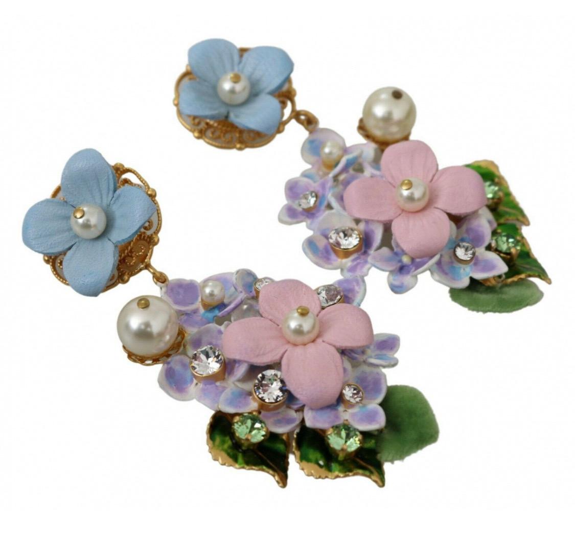 Gorgeous brand new with tags,
100% Authentic Dolce &
Gabbana earrings.

Model: Clip-on, dangling

Motive: HORTENSIA BOUQUET,
flowers, pearls

Material: 40% Brass, 30% leather,
20% crystals, 10% PA

Color: Gold, purple, pink
Crystals: Clear

Logo