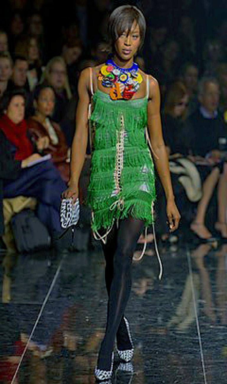 Dolce & Gabbana rare rich emerald green silk fringe dress worn on the runway by Naomi Campbell.  Inspired by the 1920's fun flapper dresses this one is beautifully designed with much attention to details.  Interior and exterior of light blue silk