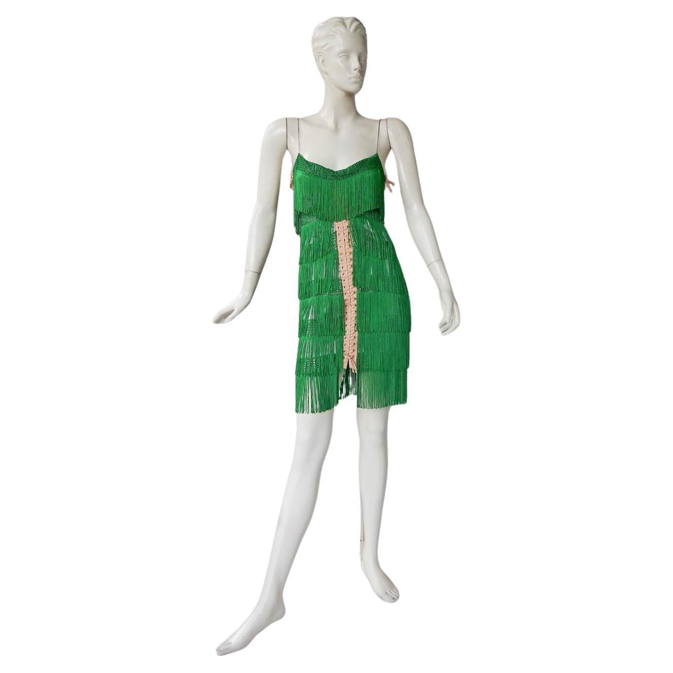 Dolce & Gabbana rare rich emerald green silk fringe dress worn on the runway by Naomi Campbell.  Inspired by the 1920's fun flapper dresses this one is beautifully designed with much attention to details.  Interior and exterior of light blue silk