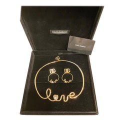 Dolce 
Gabbana Set di collane e orecchini abbinati "Love" con scatola