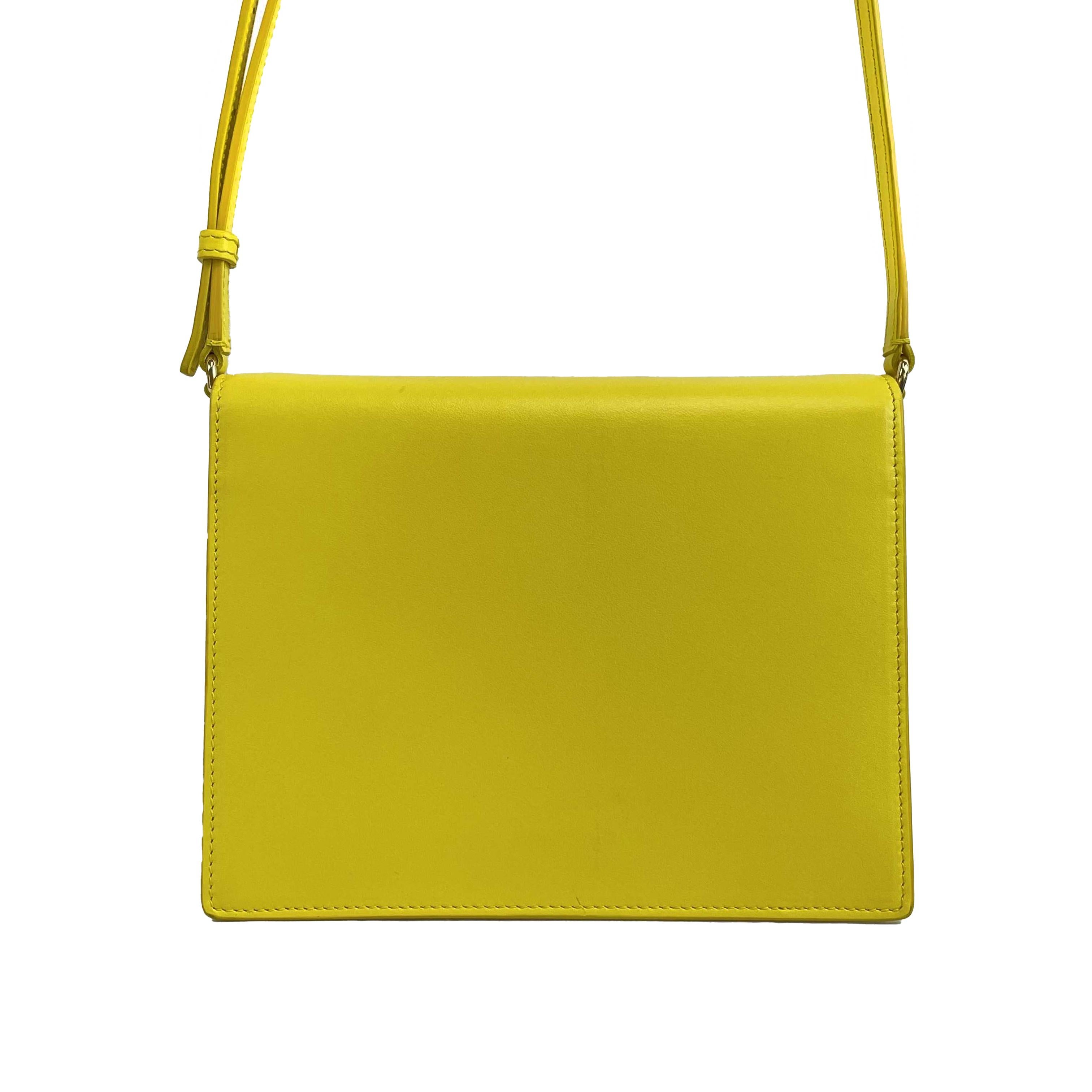 Dolce & Gabbana - NEW DG Logo Yellow Crossbody / Shoulder Bag
Measurements

Width: 7.75 in / 19.685 cm
Height: 5.65 in / 14.351 cm
Depth: 2.5 in / 6.35 cm
Strap Drop: 19.5 - 23.5 in / 49.53 cm
Details

Made In: Italy
Color: Yellow
Accessories: Dust
