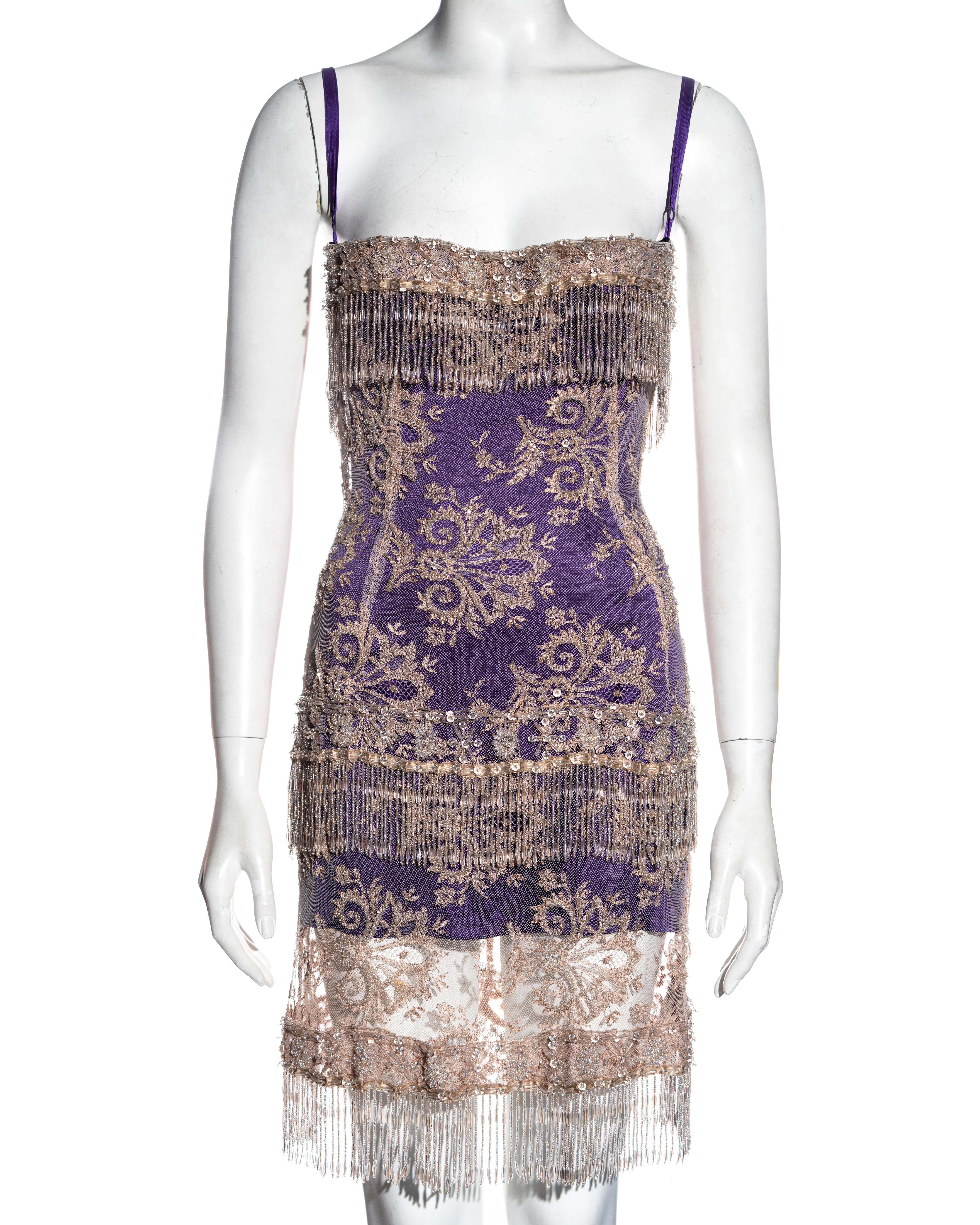 ▪ Dolce & Gabbana beaded lace mini dress 
▪ Delicate nude lace embellished with clear beads 
▪ Clear beaded tassel trim 
▪ Purple silk underdress
▪ Adjustable ribbon shoulder straps 
▪ Built-in bra
▪ IT 42 - FR 38 - UK 10 - US 6
▪ Spring-Summer