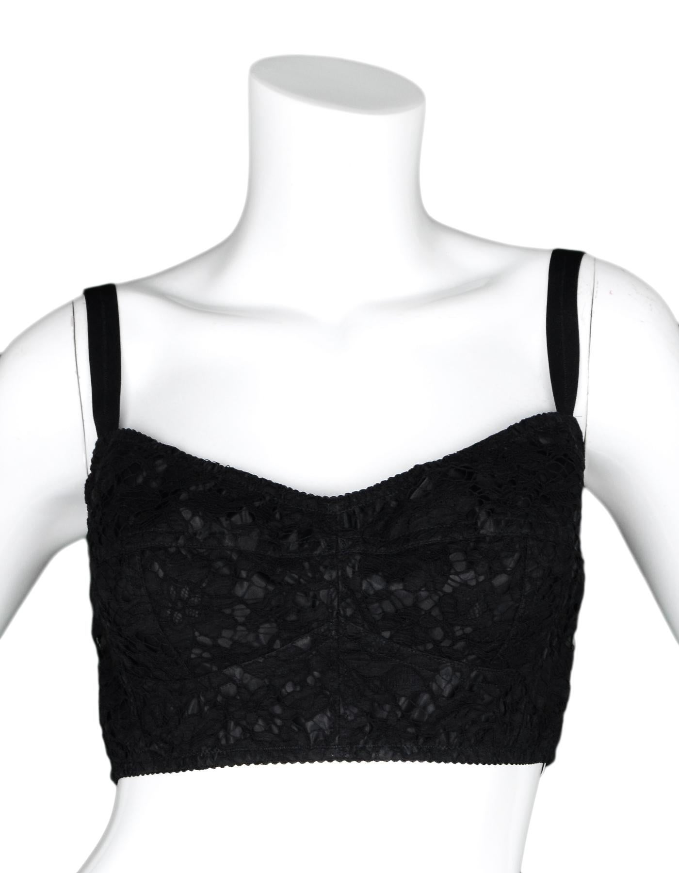 Dolce & Gabbana NWT Black Lace Bralette Bra Sz 44

Made In: Italy
Color: Black
Materials: 50% silk, 31% cotton, 15% rayon, 3% nylon, 1% other fibers
Opening/Closure: Row of three clasps at back
Overall Condition: New with tags
Estimated Retail: $600