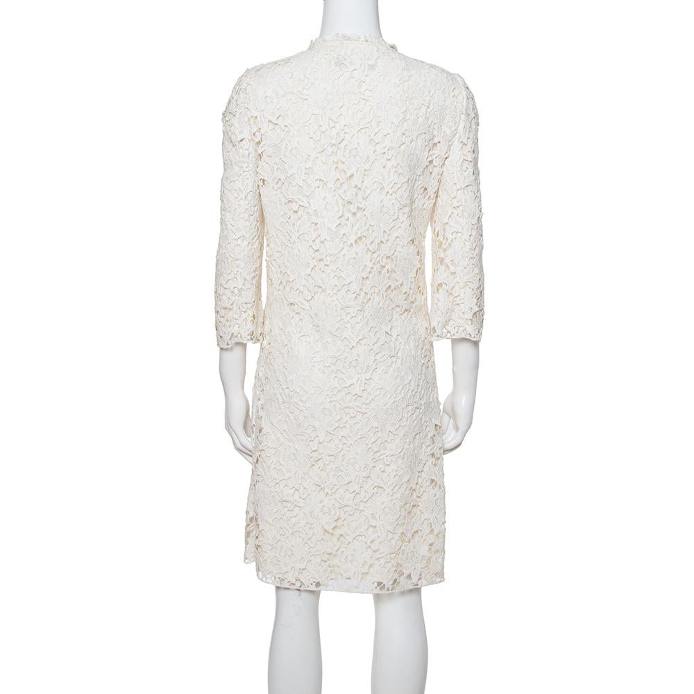 Modern and feminine elements combine in this chic coat from Dolce & Gabbana. The off-white creation is made from quality lace fabric and features a stunning silhouette. A floral pattern adds to its appeal and the coat comes equipped with front