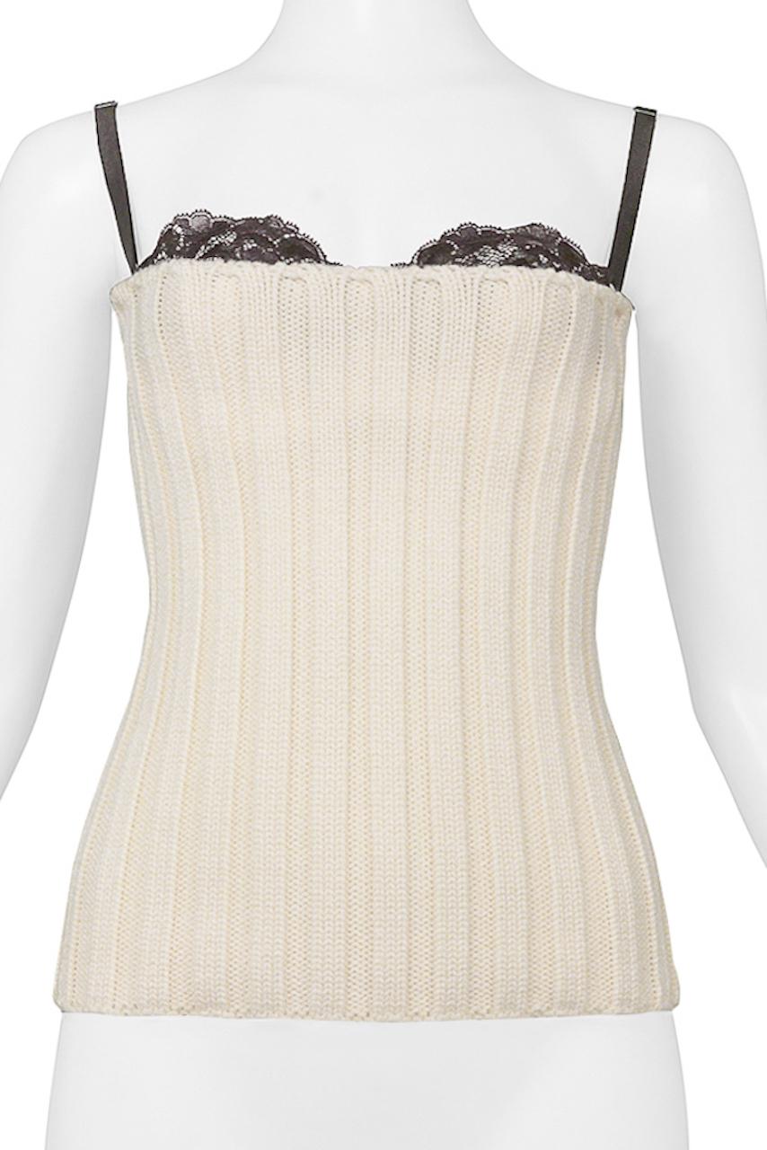 Resurrection Vintage is excited to offer a vintage Dolce & Gabbana off white ribbed knit tube top featuring a white satin with brown lace bra that snaps into the off-white knit tube, a center back zipper and adjustable straps. From the 1999