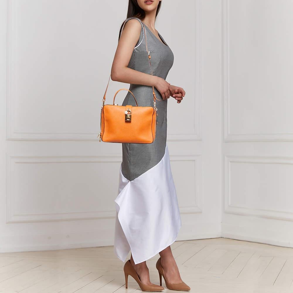 Exuding unparalleled elegance and sophistication, this bag is made from the finest material in a gorgeous hue. While the roomy interior offers ample space, the top handle allows you to carry it with much elegance.


Includes: Detachable Strap,
