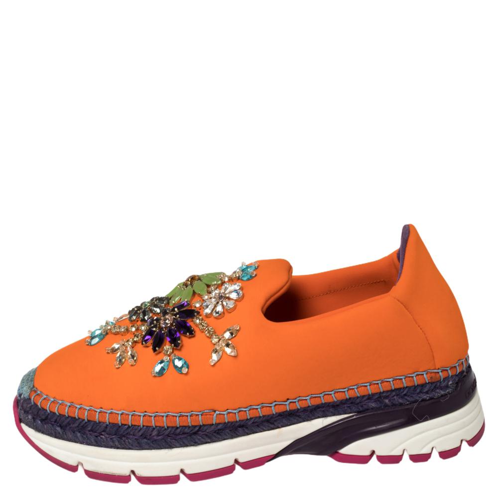 Fabulously designed to stand out and get your compliments, these slip-on sneakers from Dolce & Gabbana deserve a special place in your wardrobe! Shining bright in orange, these sneakers are crafted from neoprene and feature round toes, exquisitely