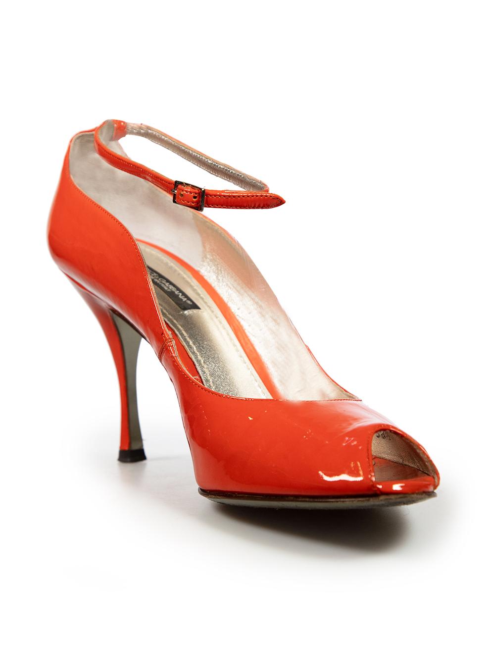 CONDITION is Good. Minor wear to heels is evident. Creasing to the patent leather exterior specially near the toe box and peep toe detail and discolouration of the insoles on both shoes. Discolouration marks are found on the left side of the left