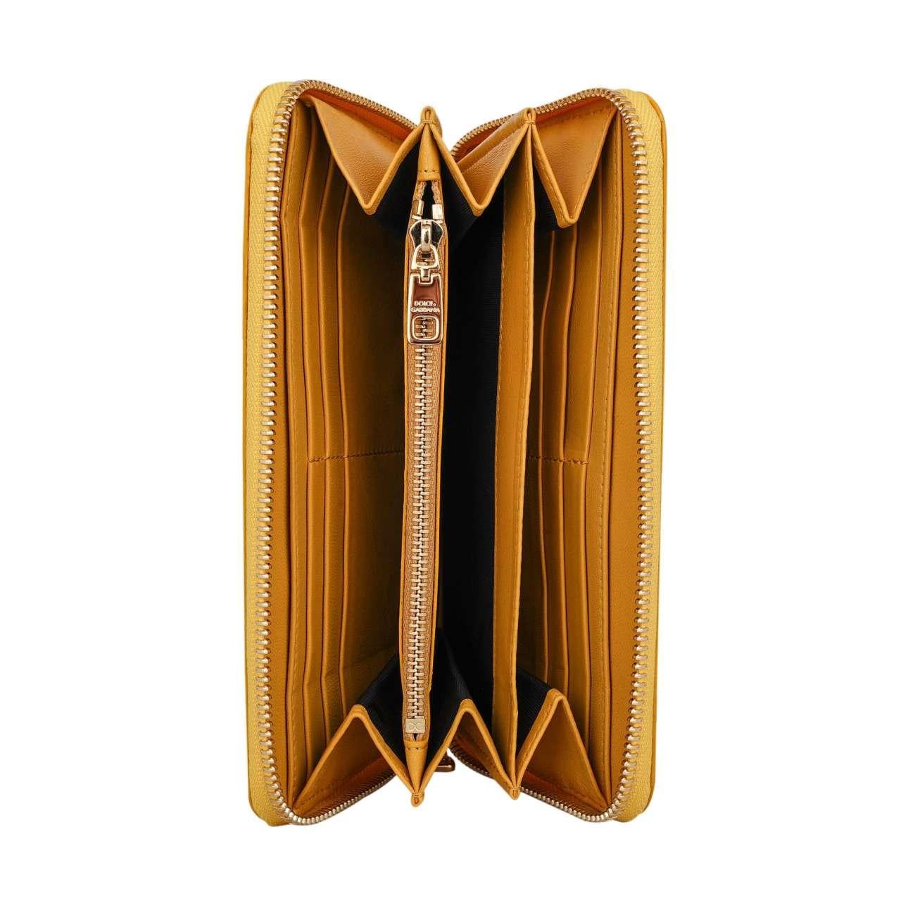 Dolce & Gabbana - Ostrich Leather Zip-Around Wallet Yellow In Excellent Condition For Sale In Erkrath, DE