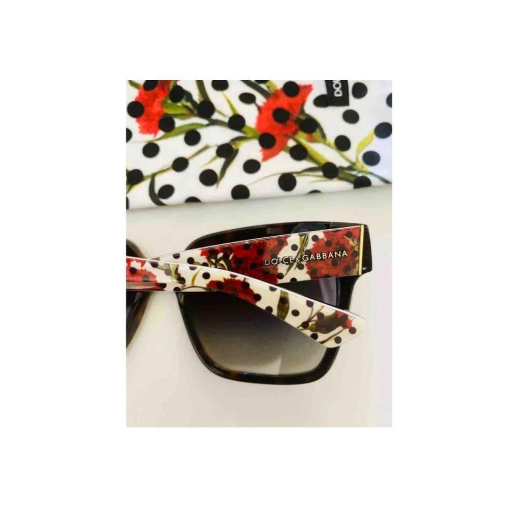 red oversized sunglasses