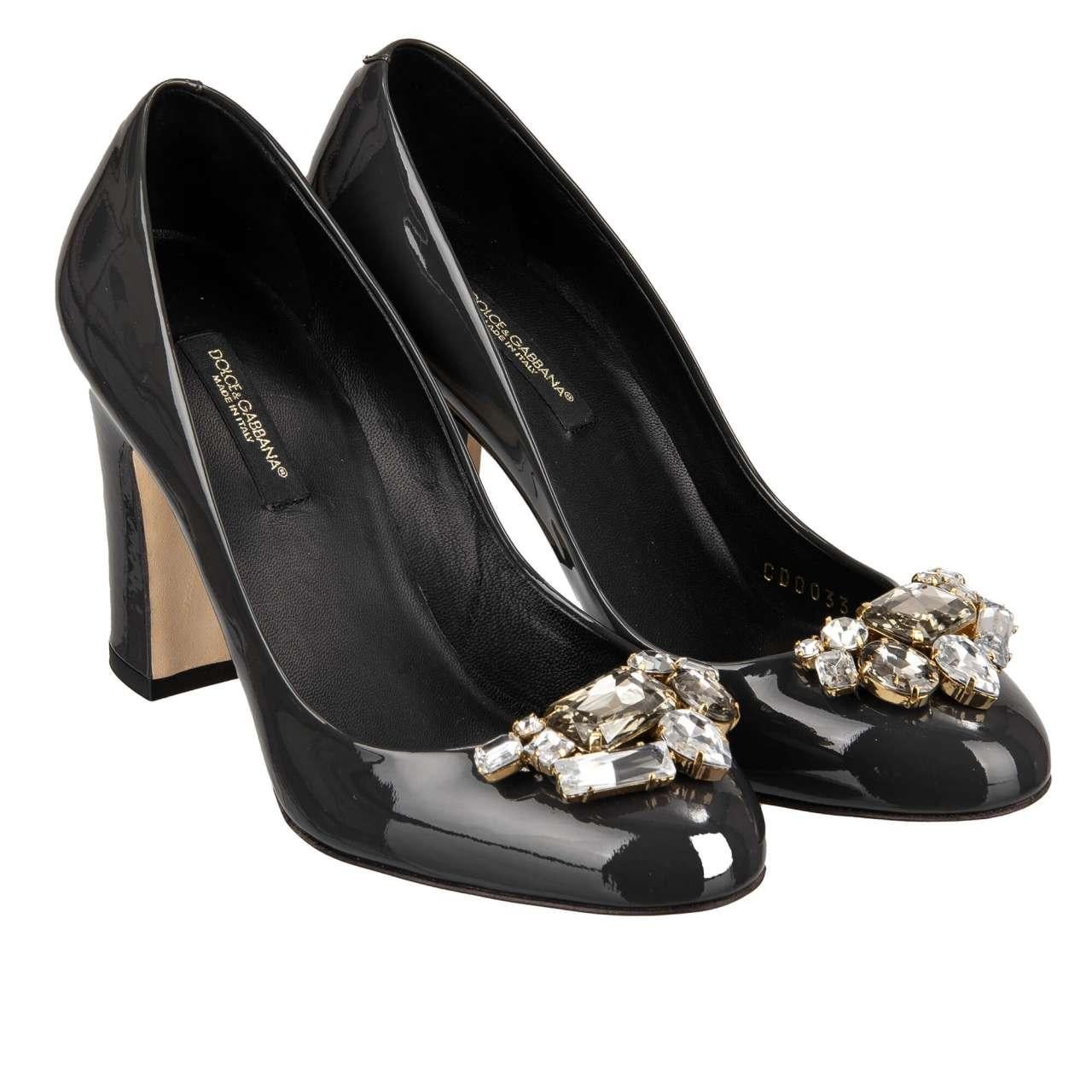- Patent leather Pumps VALLY with crystal brooch in dark gray by DOLCE & GABBANA - New with Box - MADE IN ITALY - Model: CD0033-B1842-8H712 - Material: 100% Calfskin - Inner Material: leather - Sole: Leather - Color: Dark Gray - Heel height: appr. 9