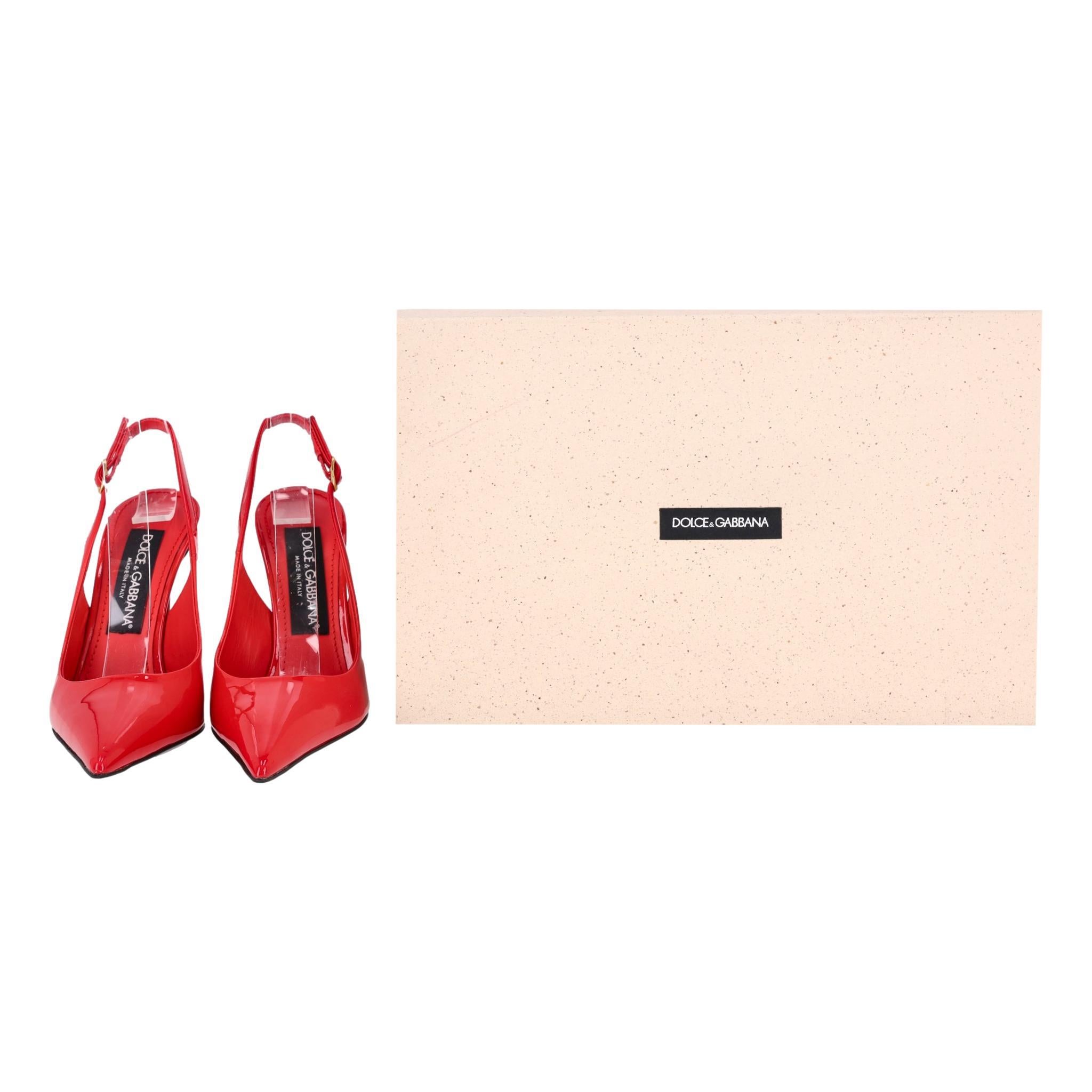 Dolce & Gabbana Patent Leather Slingback Heels

Red patent leather slingback heels designed with a pointed toe and a high stiletto heel.

Adorned with a gold 'DG' logo to the heel, branded leather insoles and buckled ankle strap.

Rrp £650

Size –