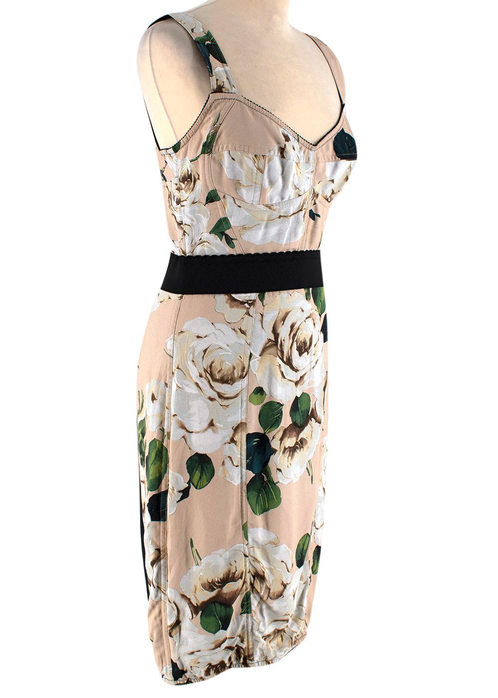 Dolce & Gabbana Peach Floral Bustier Dress

- Sleeveless dress with floral print in nude tones
- Structured around the upper bodice
- Black elasticated waistline and hemlines
- Fitted pencil skirt 
- Black panelling on the back of dress
- Zip