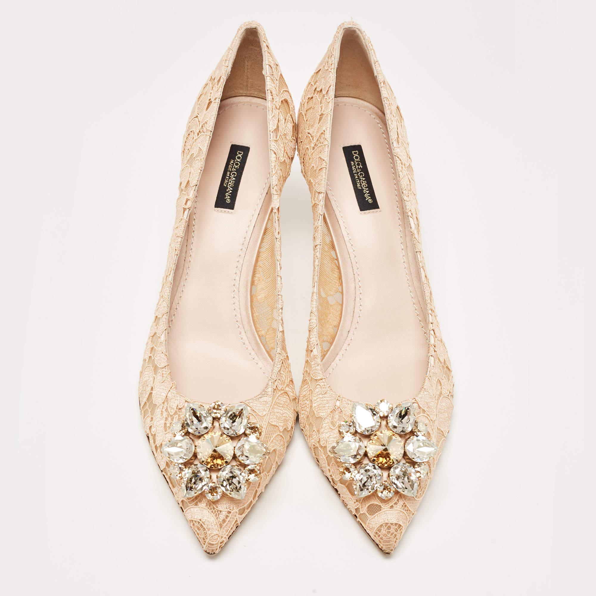This pair of Dolce & Gabbana is intricately designed with lace and makes for a captivating creation. In a pleasing peach shade, a beautiful crystal embellishment sits atop its toes, and its 7.5cm heels will add grace to every step.

