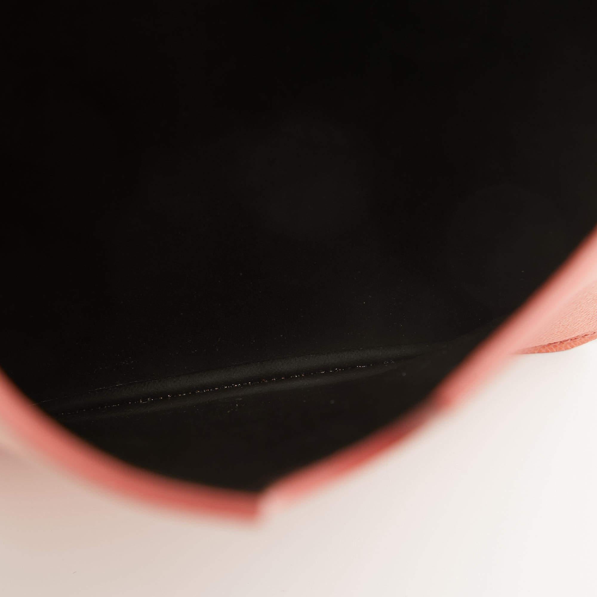 A stylish accessory for your iPad, this case is not just visually appealing, but also highly useful. Crafted from supple peach leather, this iPad case comes with a logo plaque.