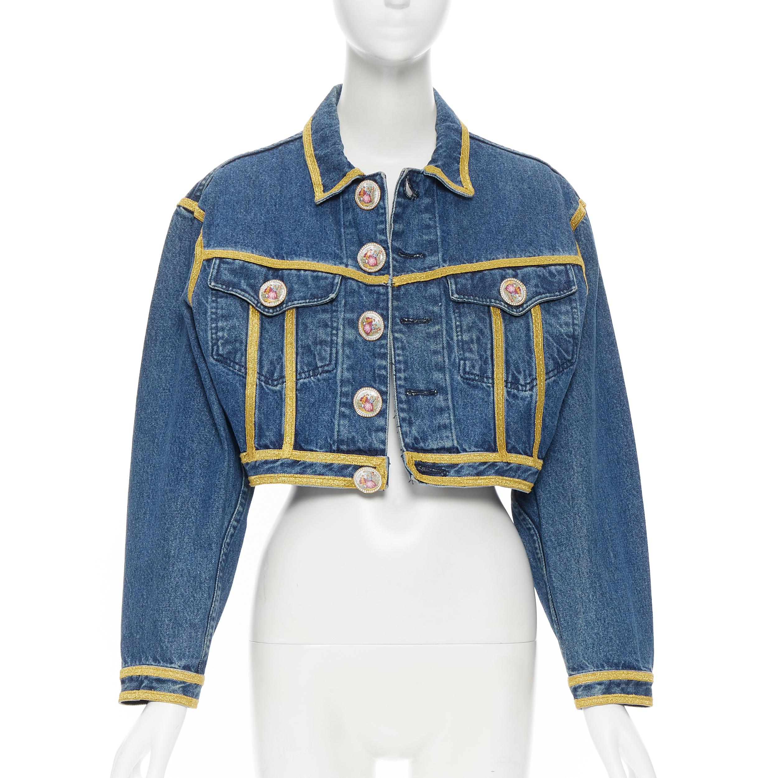 DOLCE GABBANA Pearl Miniature painted enamel cropped denim jacket set XS 
Reference: GIYG/A00072 
Brand: Dolce Gabbana 
Material: Denim 
Color: Blue 
Pattern: Solid 
Closure: Button 
Extra Detail: Jacket comes with complimentary denim jeans. Painted