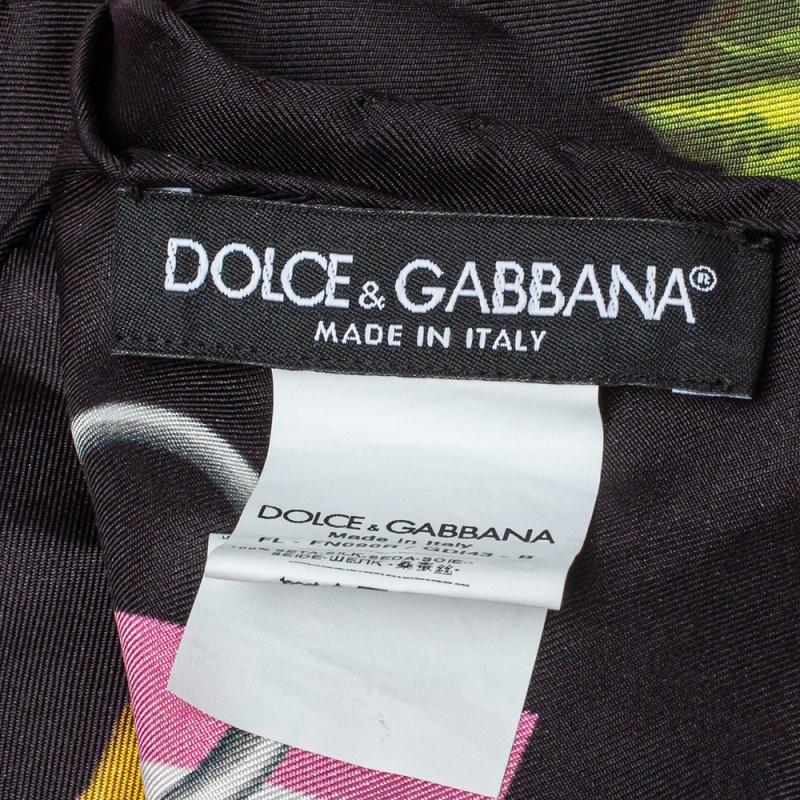 Lovely to look at, this scarf from Dolce & Gabbana will compliment any outfit you wear. The pink scarf is made of silk and features a butterfly-floral print all over.

