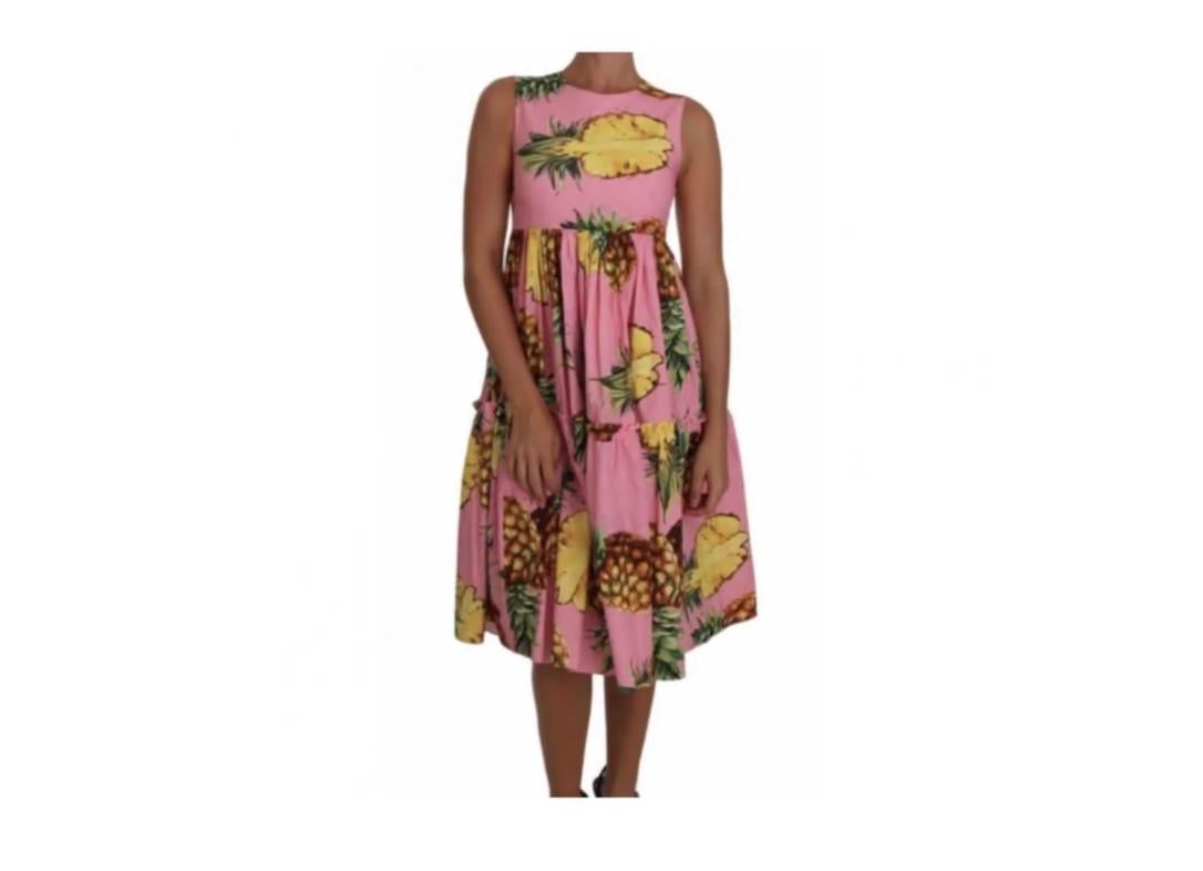 Dolce & Gabbana pineapple print midi dress. 
 
 Style: Sheath dress 
 Color: Pink with pineapple print 
 Zipper in the back 
 Logo details 
 Made in Italy 
 Very exclusive and high quality manufacturing 
 
 Material: 100% cotton 
 
 Size: 38IT - UK6