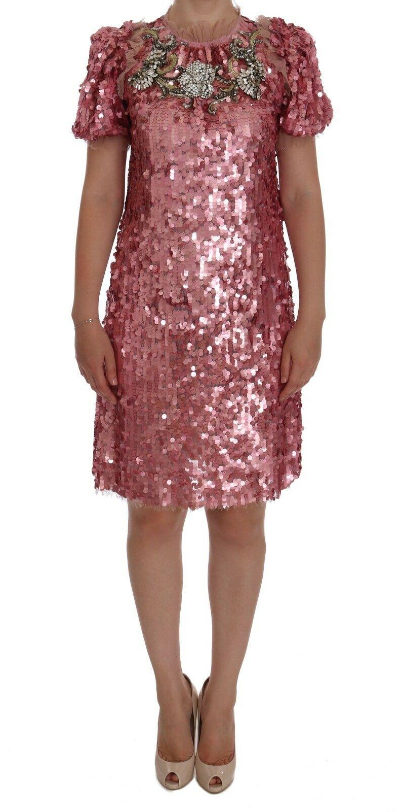 Gorgeous brand new with tags, 100% Authentic Dolce & Gabbana pink sequined crystal shift dress.




Model: Short sleeve shift above knees length dress

Color: Pink
Crystals: Clear and gray

Zipper opening on the back


Stretch inside lining

Logo