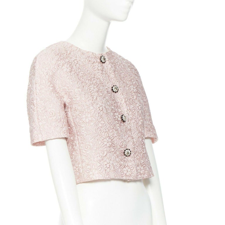 Bonnet beige en point de jersey avec revers et petit logo de la marque Bonnet beige en point de jersey avec revers et petit logo de la marque