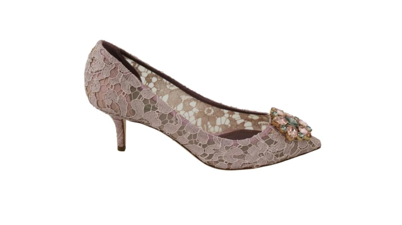  Gorgeous brand new with tags, 100% Authentic Dolce & Gabbana Heels Pumps.




Model: Heels Pumps

Material: 59% Viscose 30% Cotton 7% Silk 4% Nylon
Color: Pink floral Lace 

Pink and gray crystals

Leather sole
Logo details
Made in Italy




Size: