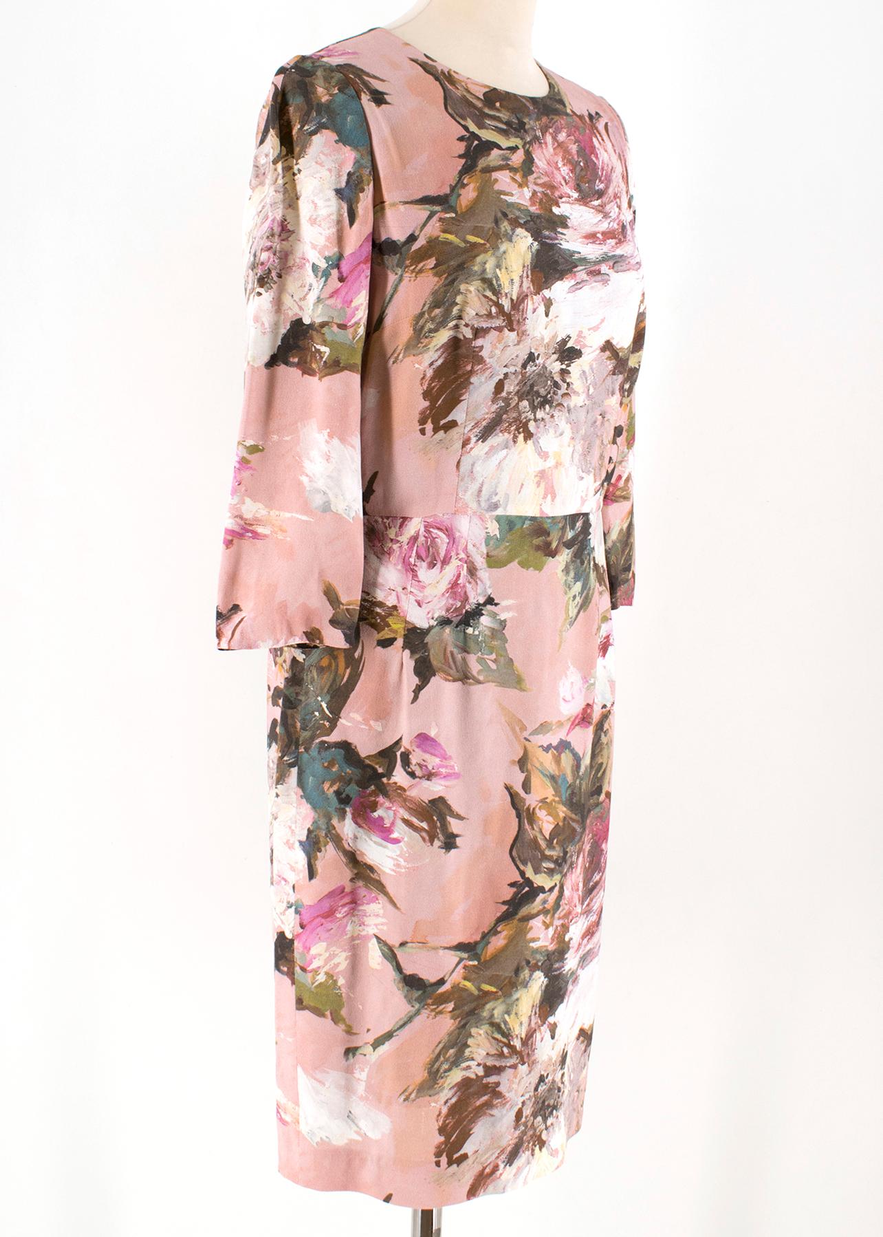 Dolce & Gabbana Pink Floral Midi Dress 

- Pink Print Dress
- Round neck, mid-sleeved 
- Seamed at waist 
- Floral water color print 
- Zip fastening closure at back
- Leopard print lining  

Please note, these items are pre-owned and may show some