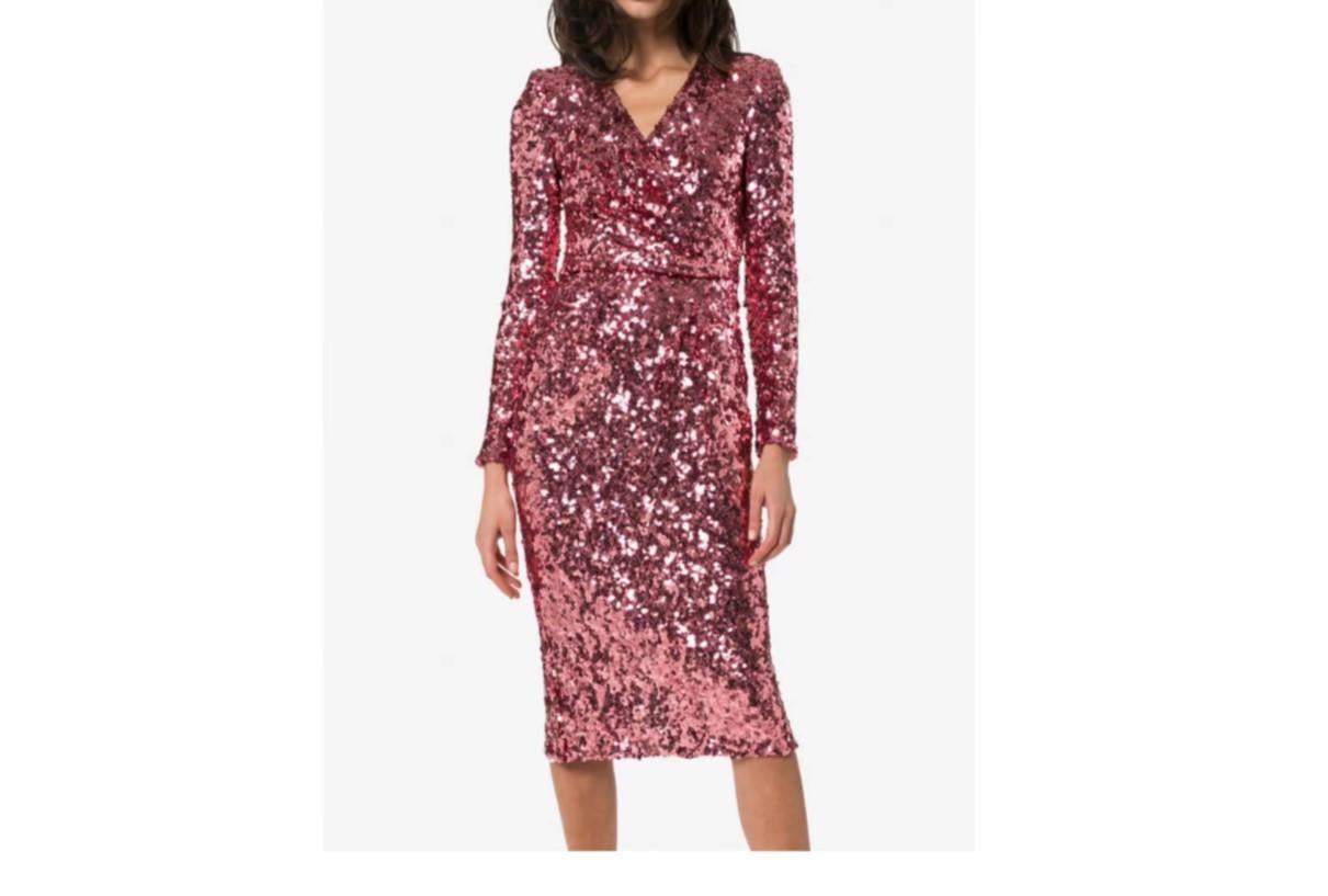 Stunning Dolce & Gabbana sequin wrap dress boasts Italian craftsmanship. Fitted with a rear zip fastening, this style has a V-neck, long sleeves and rear split hem.

Size 42IT - UK10 - M.  

Composition: Polyamide 94%
Elastane 6%
Washing