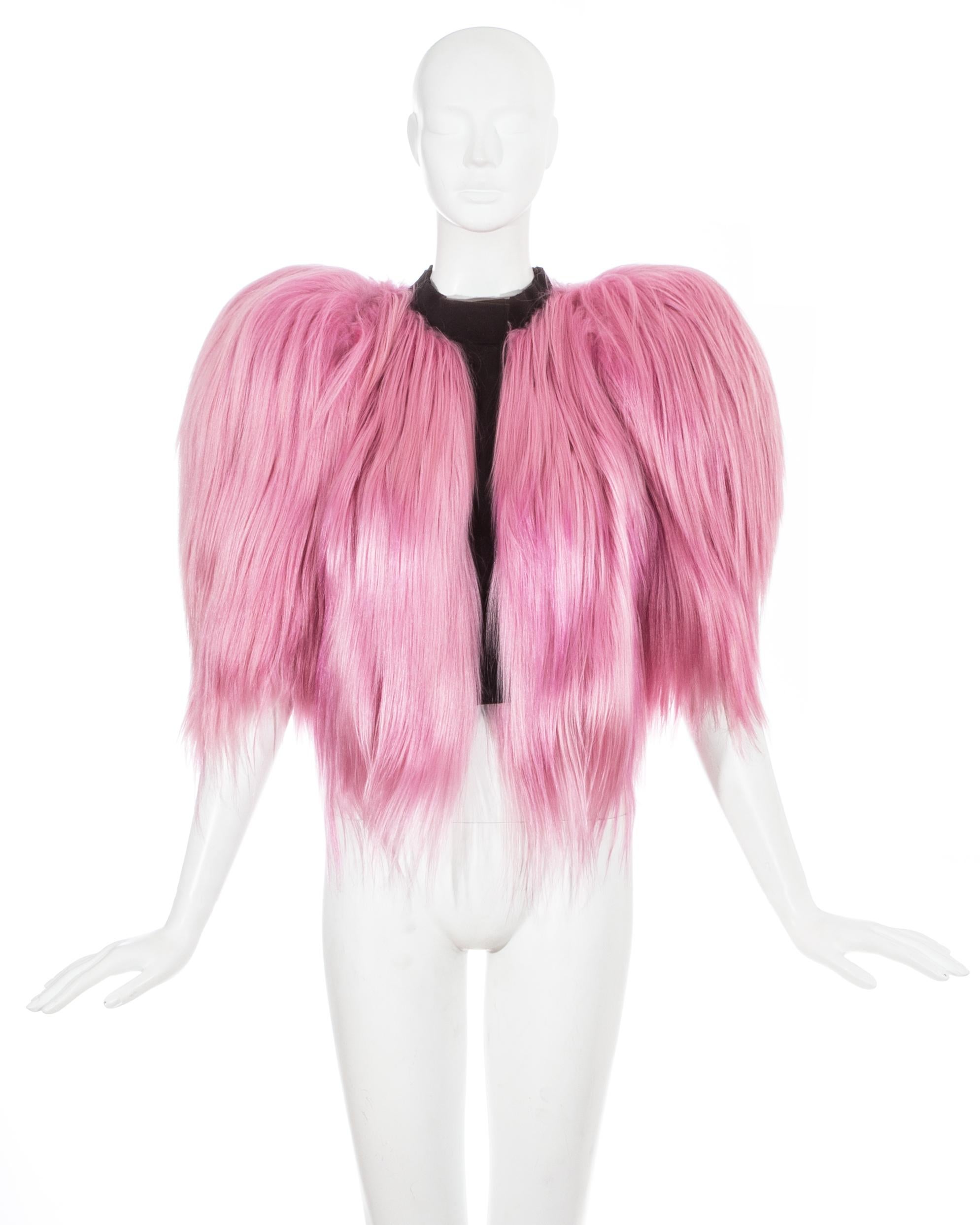Dolce & Gabbana pink goat hair coat with exaggerated shoulders

Fall-Winter 2009