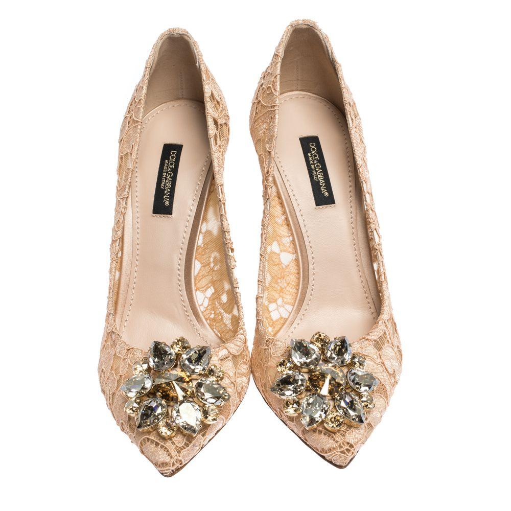 These striking pumps by Dolce & Gabbana will make sure you deliver style every time. Crafted from lace, they are styled with pointed toes, crystal embellishments, and high heels. They are finished with comfortable insoles and durable