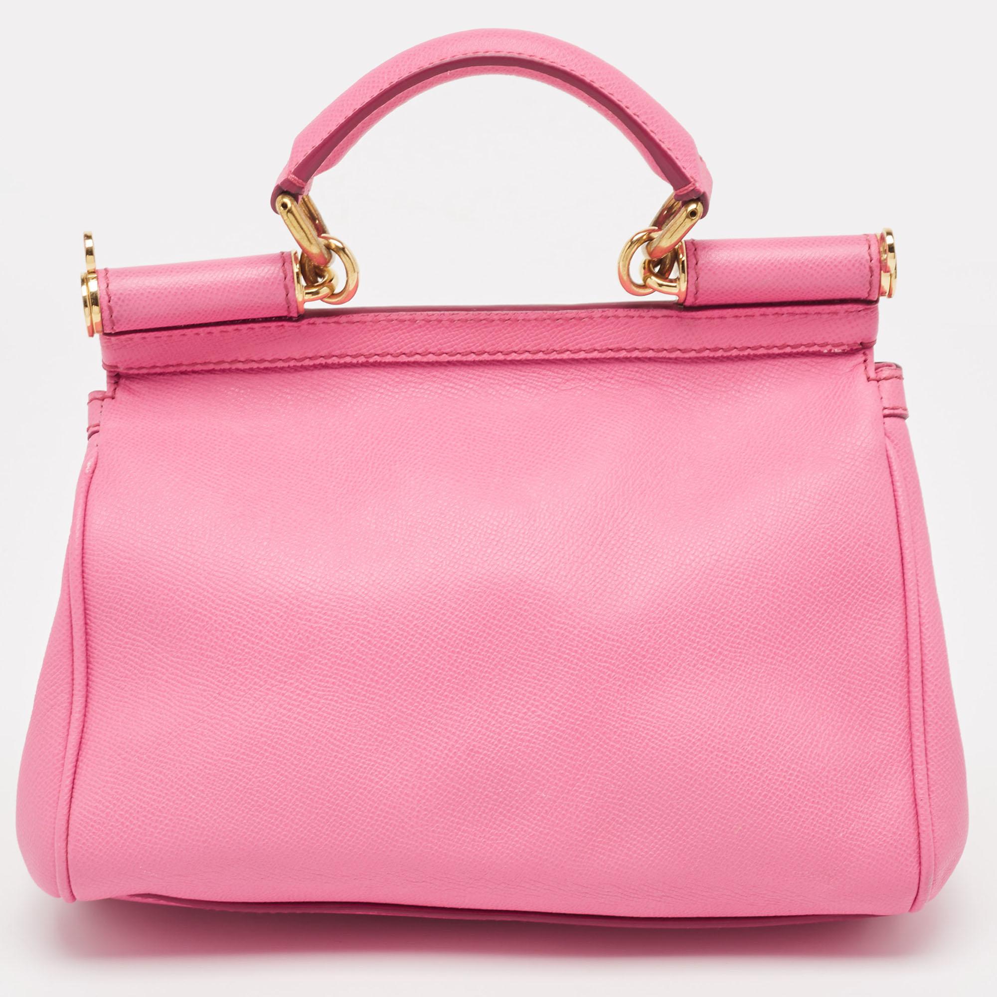 Presented for the 2009 Fall/Winter collection, Miss Sicily from Dolce & Gabbana represents the brand's regard for Italian essence and feminine style. This pink creation comes made from leather and can be carried conveniently by dual top handles.