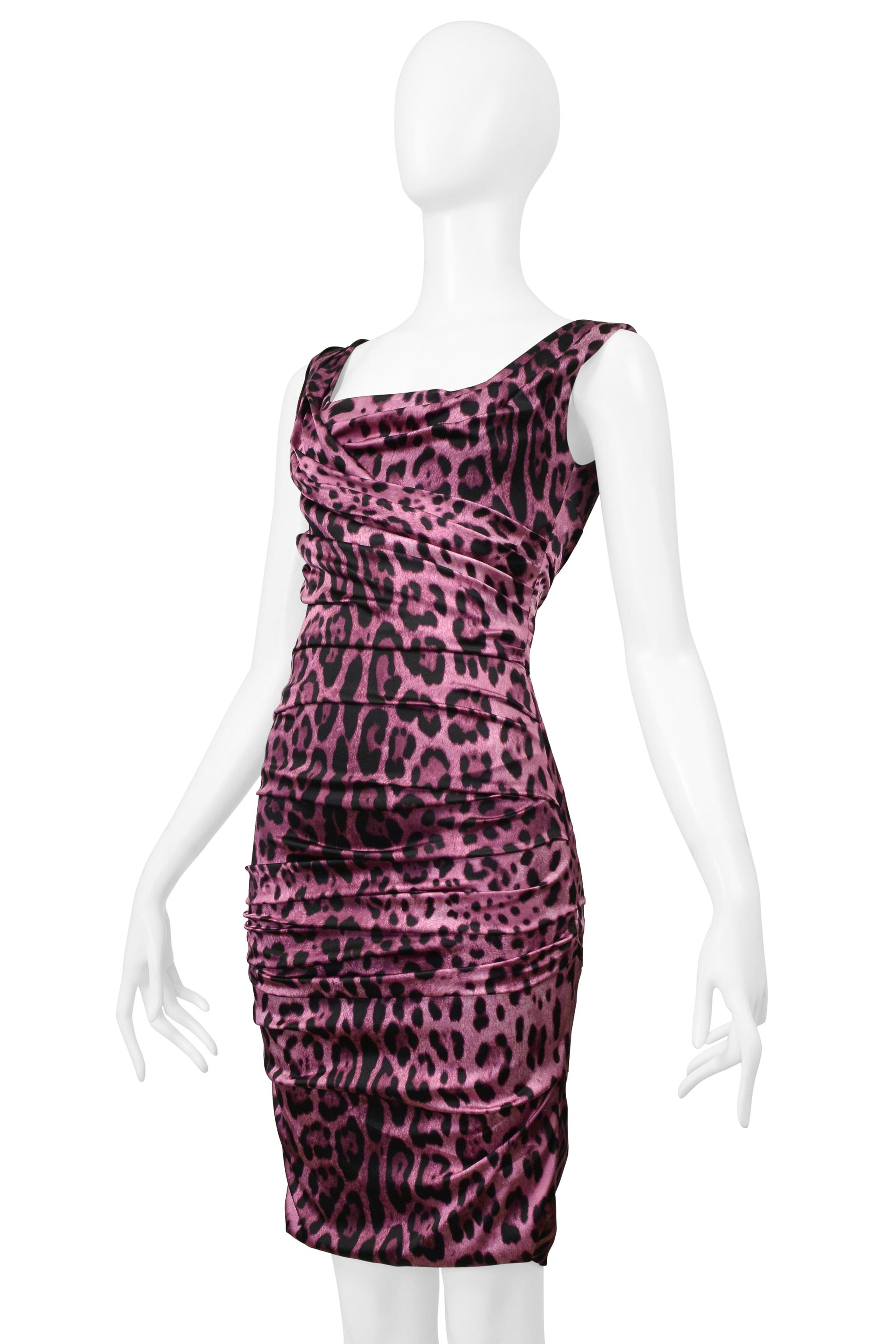 Resurrection Vintage is excited to offer a vintage Dolce & Gabbana piink silk jersey with stretch featuring a leopard print, draping, thick straps, open back, and center back zipper.

* Dolce & Gabbana
* Size: 38
* Fabric: 96% Silk, 4% Elastane
*