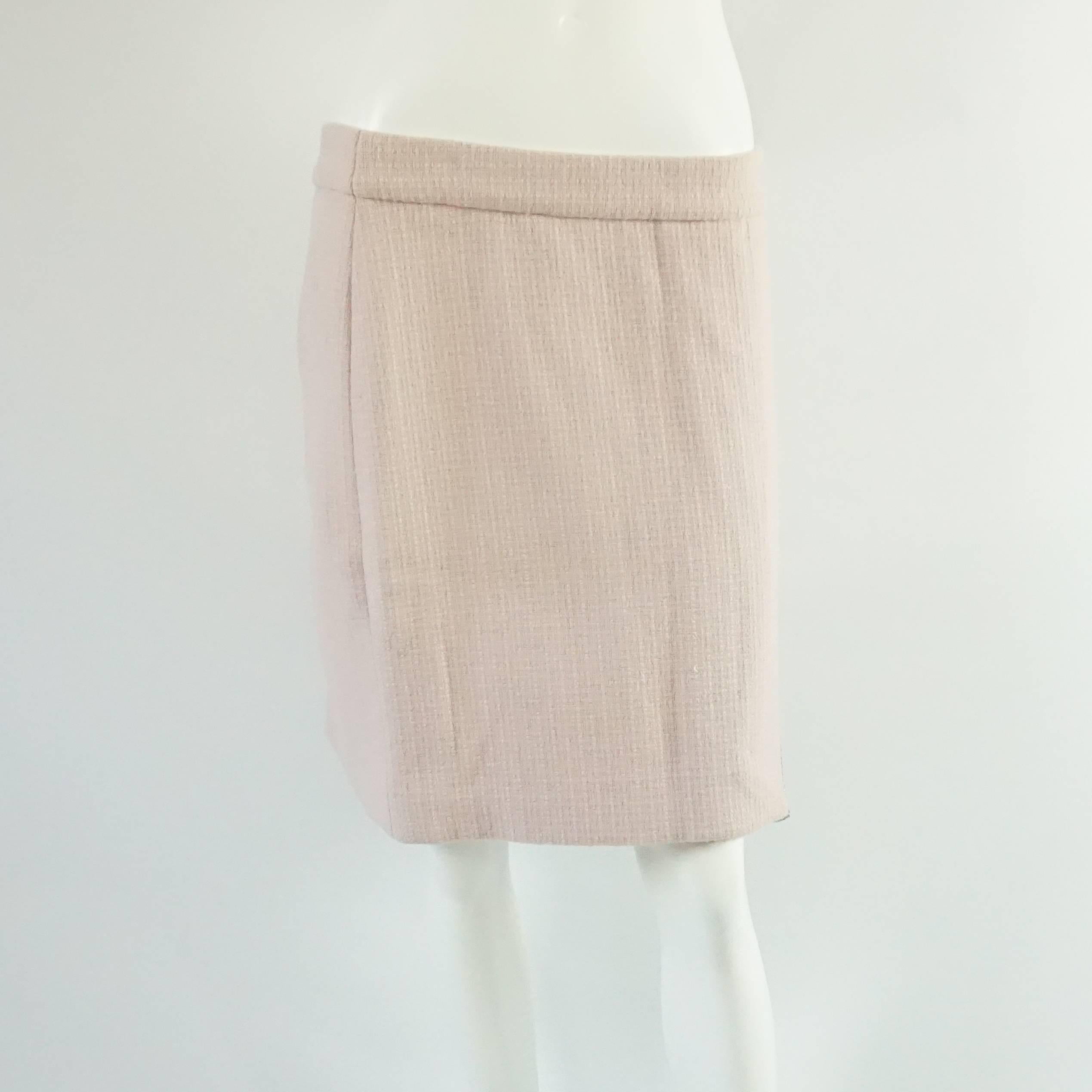 Dolce & Gabbana Pink Tweed Skirt Suit with a Rhinestone Logo Trim - Size 44 In Excellent Condition For Sale In West Palm Beach, FL