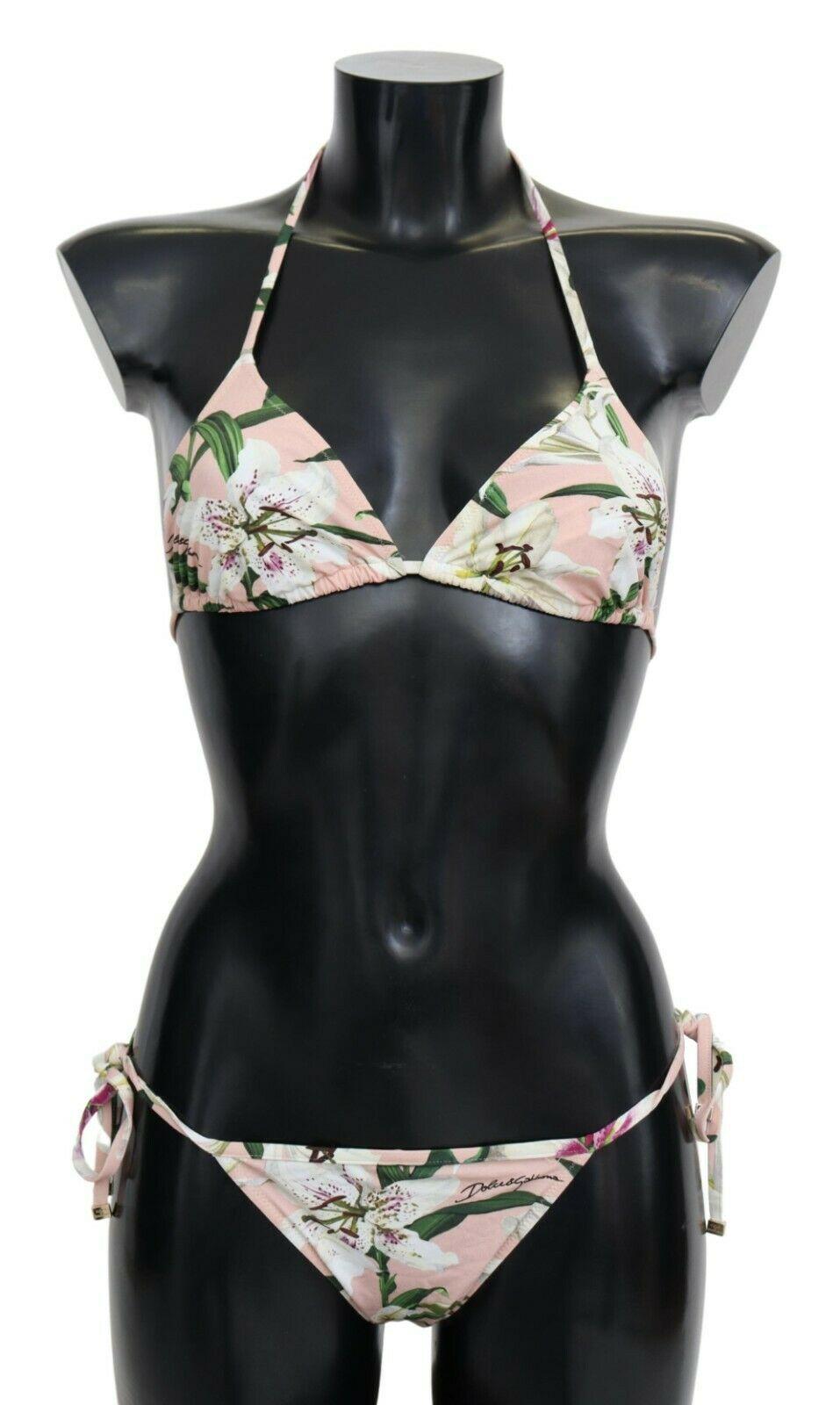 Gorgeous brand new with tags, 100% Authentic Dolce & Gabbana two piece bikini. 

Color: Pink with multicolor floral print

Model: Bikini two piece set, top and bottom

Material: 25% Elastane, 75% Polyamide

Logo detailing

Made in Italy

Size: IT2