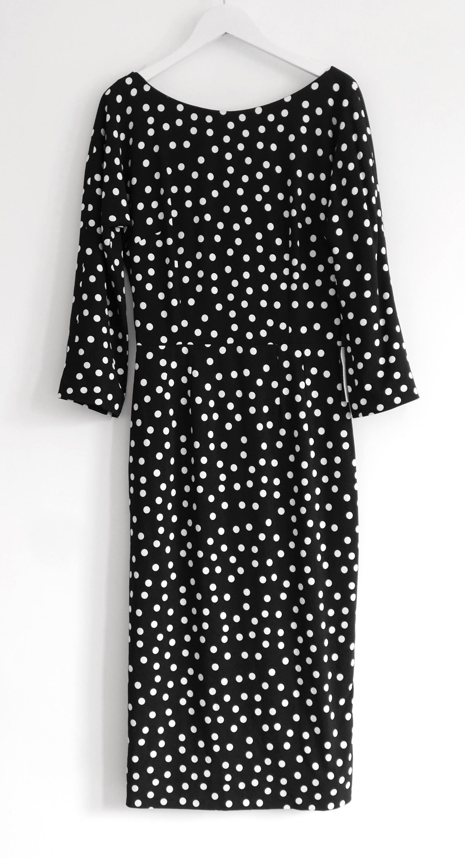 Gorgeous, ultra feminine Dolce & Gabbana polka dot print sheath dress. Bought for £2175 and new with tag. Made from soft black and white viscose/elastane crepe with a classic mini polka dot print. It has Dolce’s signature tailored pencil cut with