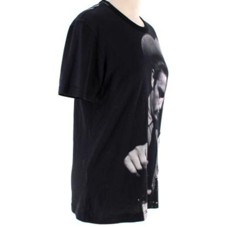 Dolce & Gabbana Black Cotton James Dean Floral T-Shirt

- Soft black cotton with a James Dean digital print 
- Flower applique patches
- Round neck
- Short sleeves

This item runs small to size, please review item measurements

9 very good