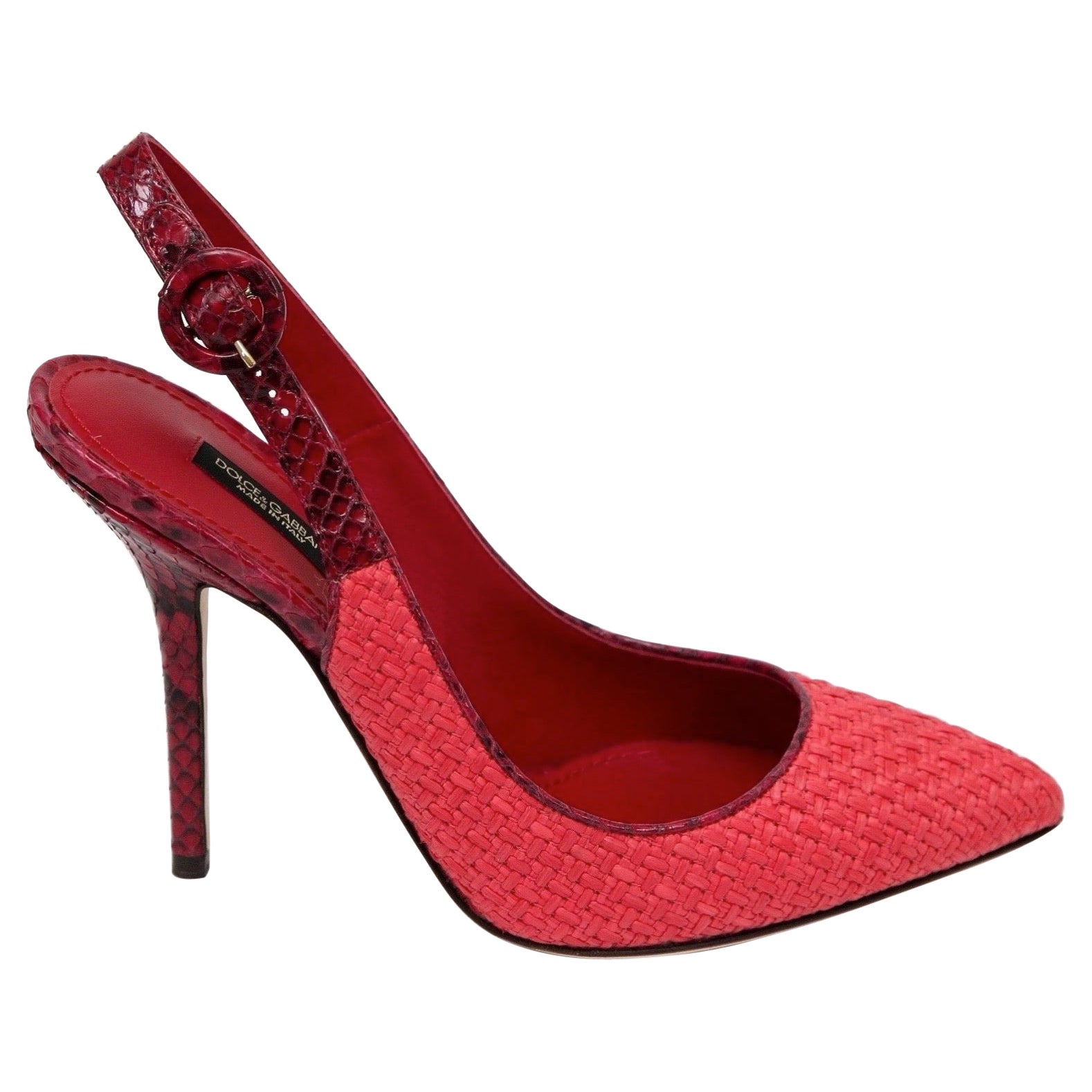 GUARANTEED AUTHENTIC DOLCE & GABBANA RED RAFFIA PYTHON SLINGBACK PUMP
Brand New In Box

Retail excluding tax, $995


Details:
- Red raffia pointed slingback pump.
- Red python trim, covered buckle and heel.
- Leather lining and sole.
- Comes with