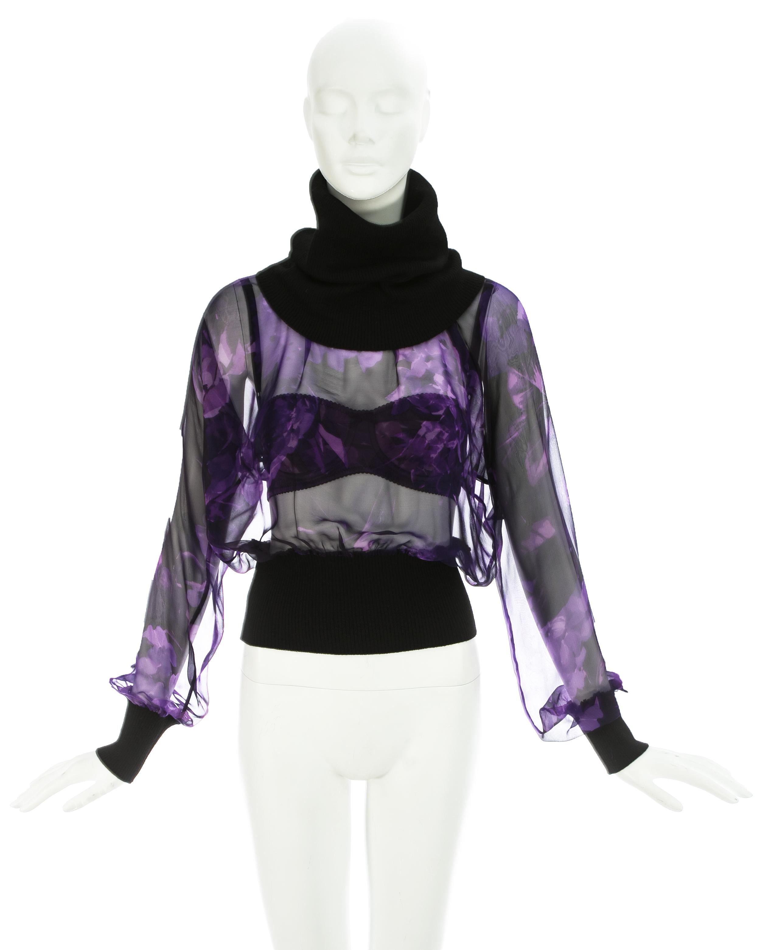 Dolce & Gabbana; Floral purple silk chiffon evening blouse with black wool cuffs and large turtleneck collar. Paired with a matching satin bra with adjustable shoulder straps. 

Fall-Winter 1999

